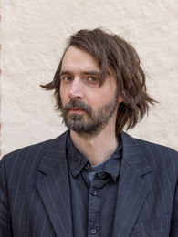 Poträttbild av Linus Gårdfeldt