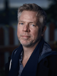 Poträttbild av Henrik Tamm